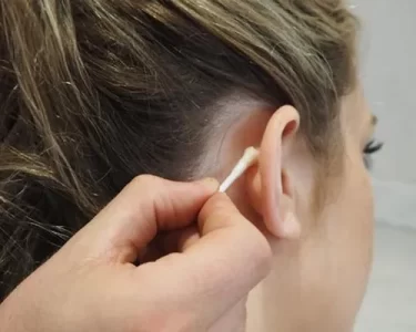 new skincare product patch test behind ear