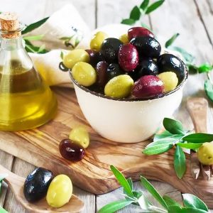 Olive fruit in bowl, olive leaf extract Hydroxytyrosol